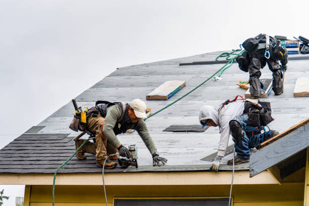 Professional Gutter Installation technician working in Williamstown, MA